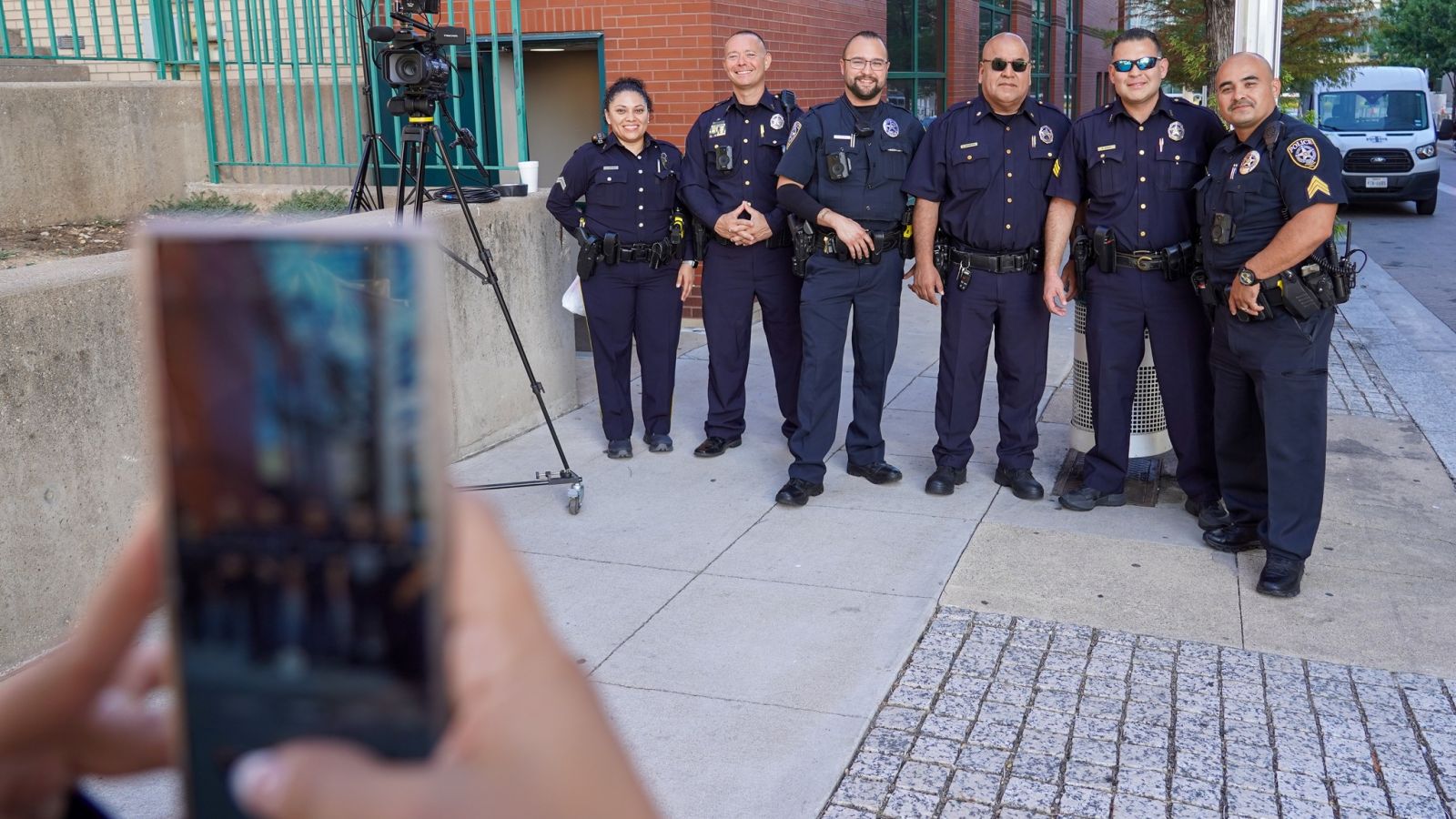Police officers taking a photo